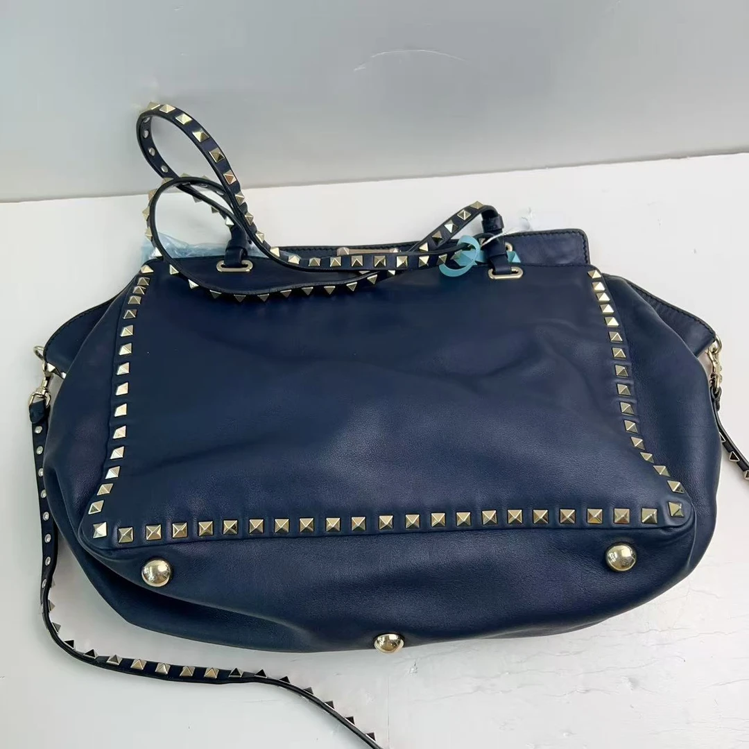 95新 Valentino/华伦天奴 华伦天奴蓝色铆钉百搭托特包