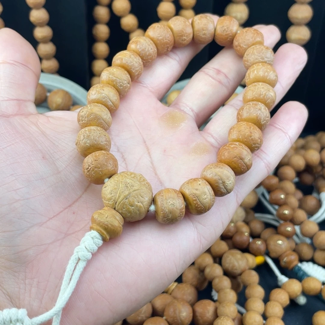 手串凤眼菩提W08-k60凤眼菩提14+同树藏式胖墩墩