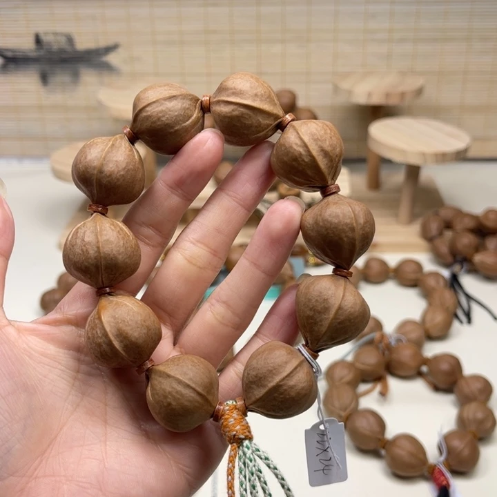 陈***肉手串/手链橄榄核22.24精品梅林铁核