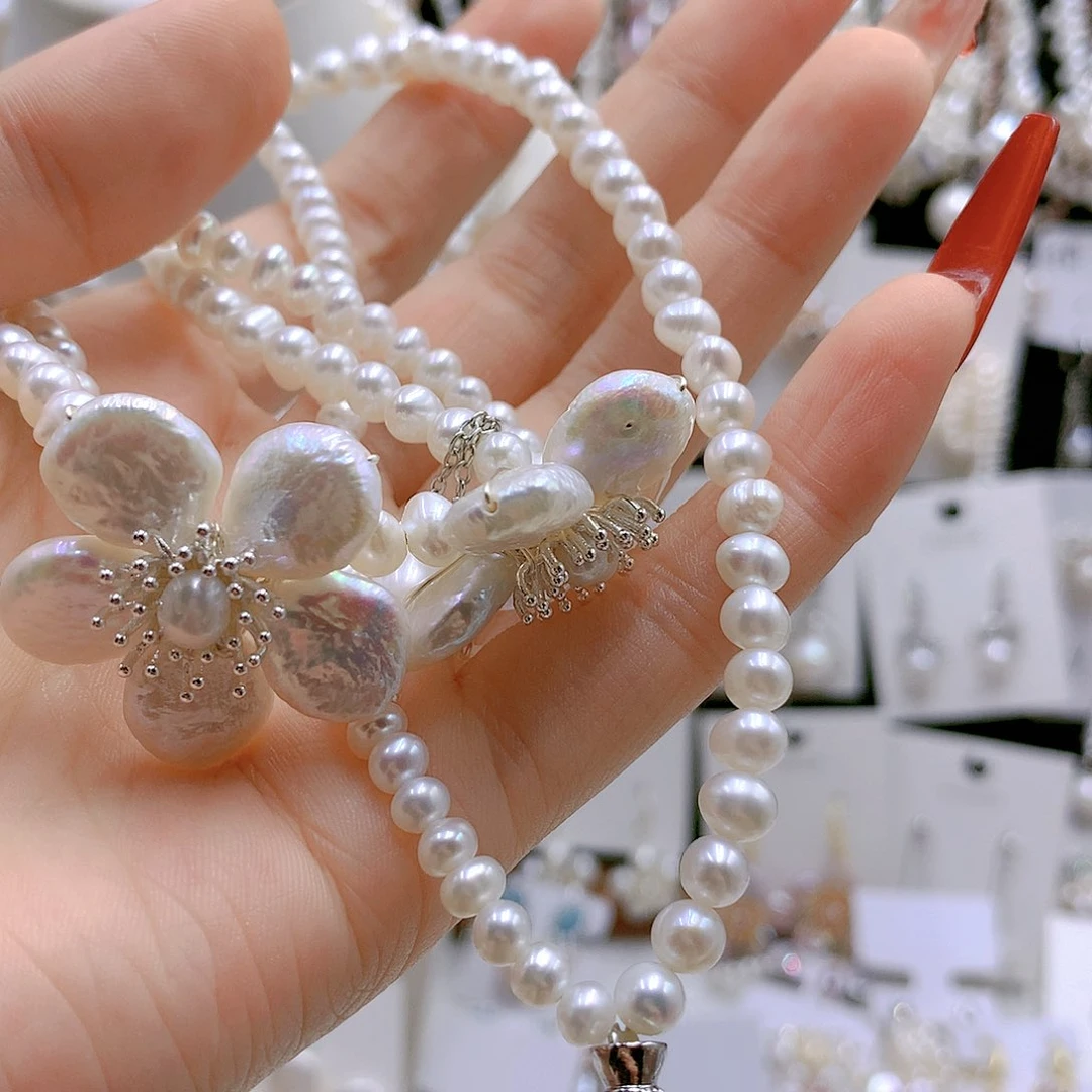 银S925镶嵌耳饰淡水珍珠喜***?