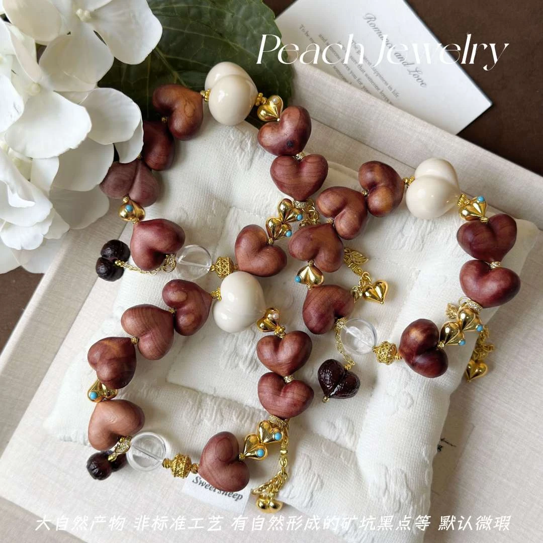 《桃心炮弹》白水晶屁桃血柏象牙果手链X-AX170多样性发一颜色微差