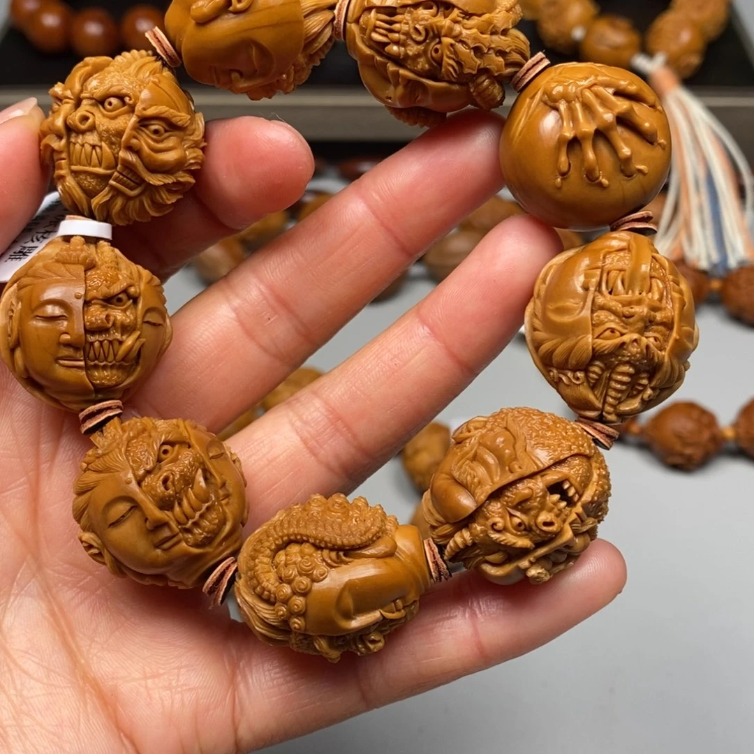 橄榄核吊坠佛魔一念