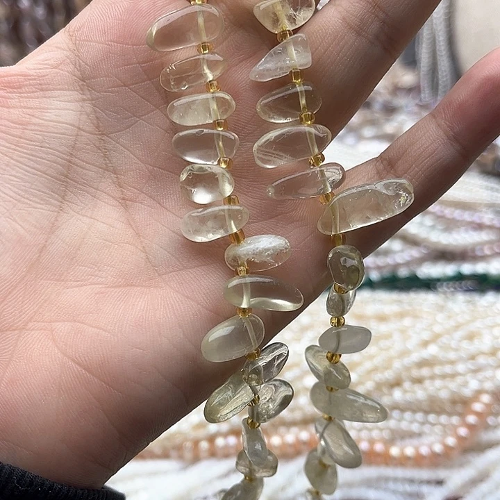 未镶嵌玛瑙/玉髓珠宝半成品一条柠檬晶侧孔长牙