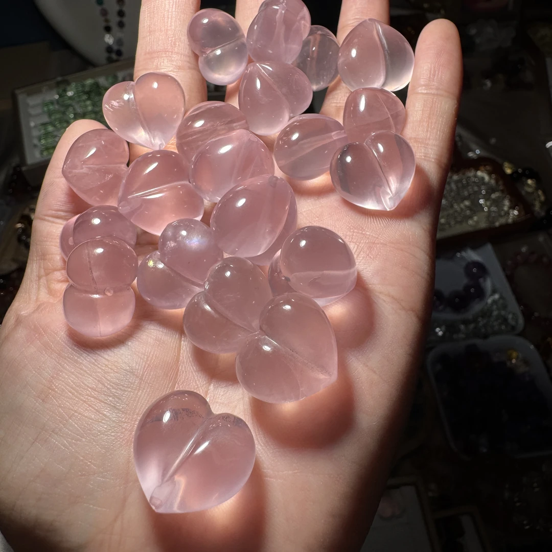 高品星光粉水晶屁桃上下孔单颗