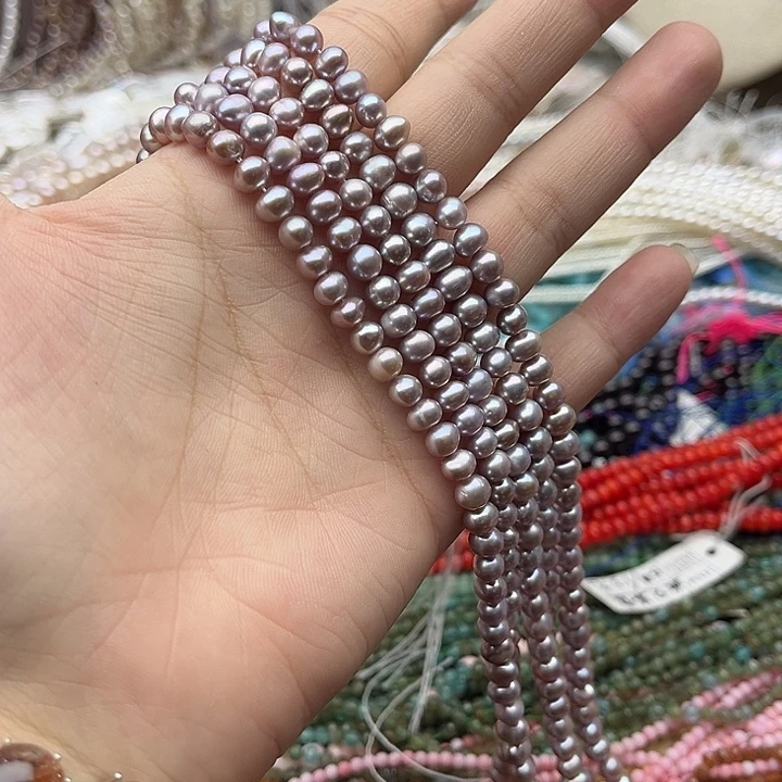 玛瑙/玉髓未镶嵌珠宝半成品一条5-6mm左右椭圆紫珍珠