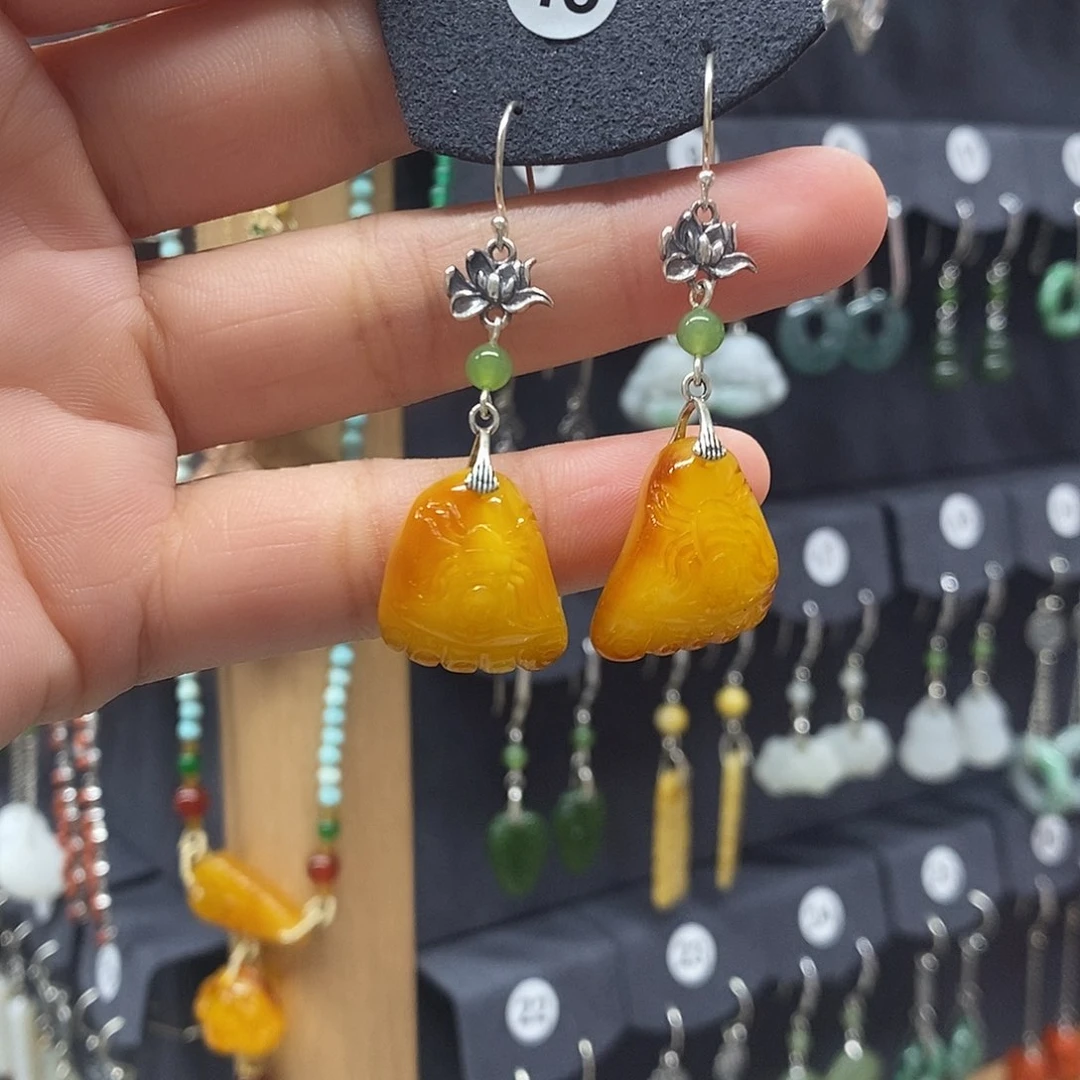 晓***艳银S925镶嵌琥珀耳饰