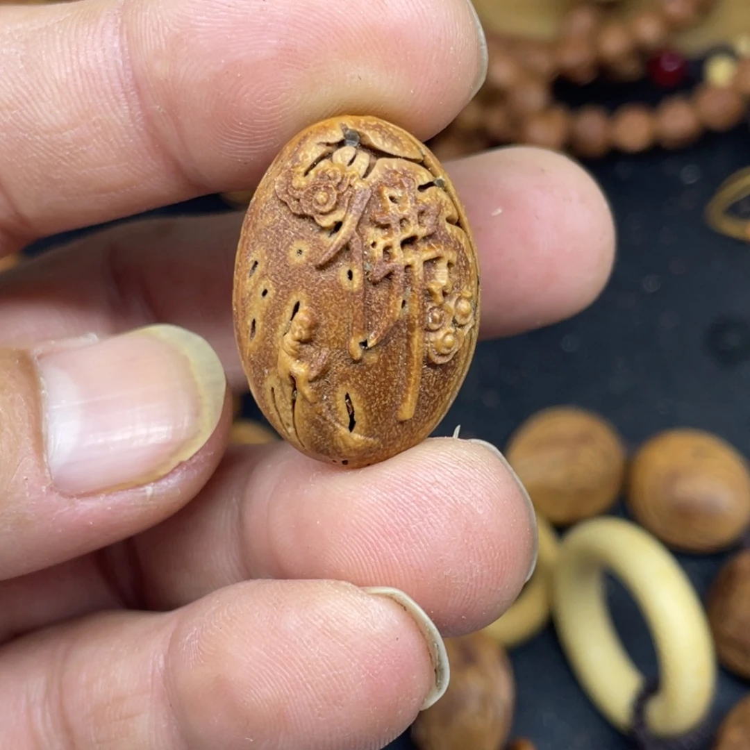 桃核雕刻一心向佛单粒