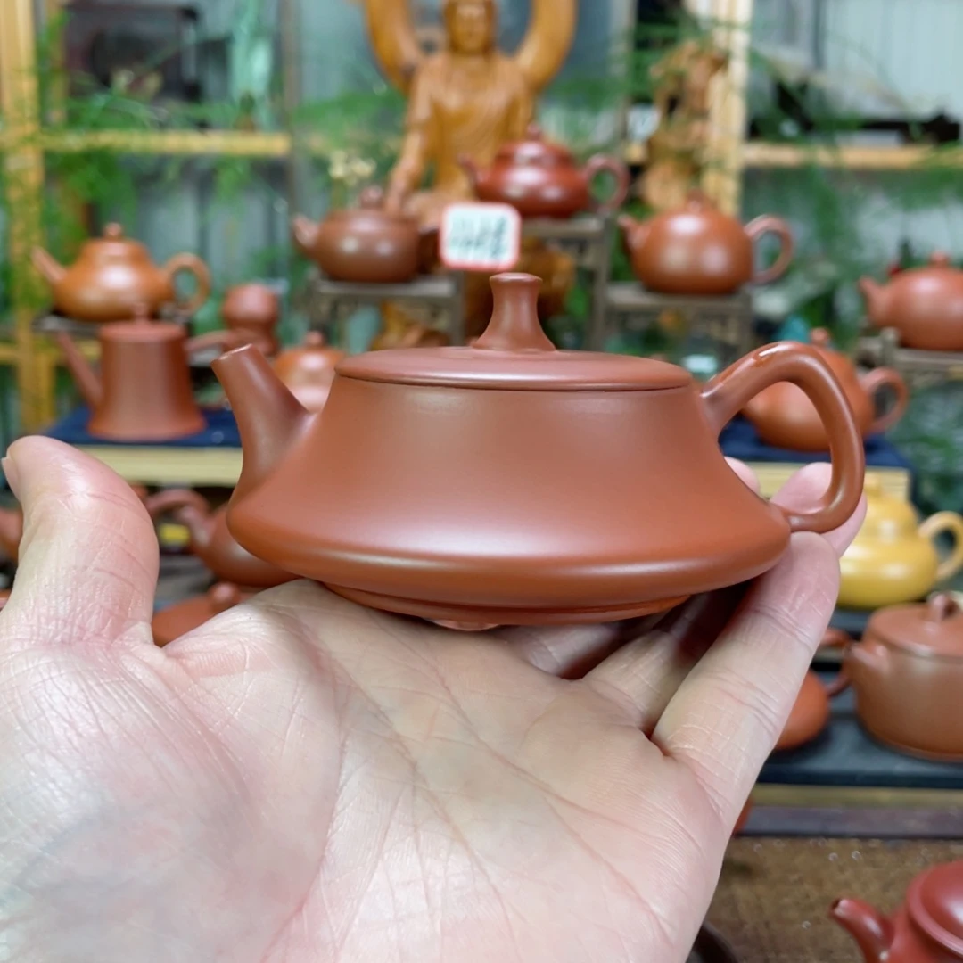 紫砂茶壶汕****司朱泥石瓢