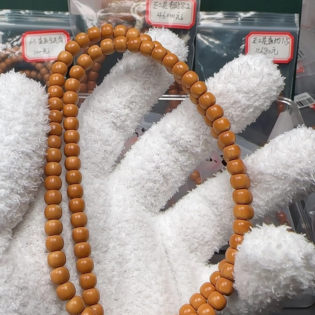 吊坠橄榄核6.1mm老挝核尖长串福利款微白