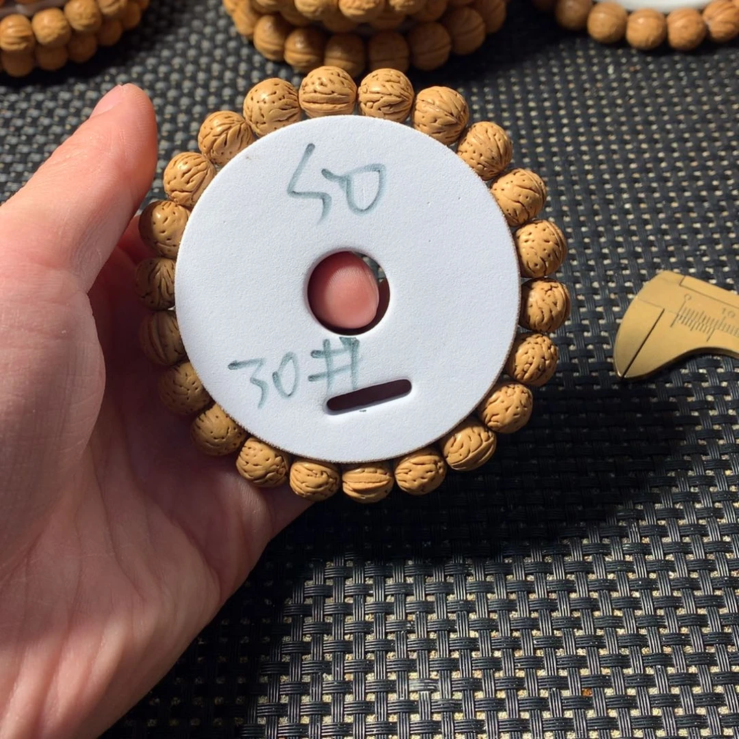 恭***8桃核手串30号链接，