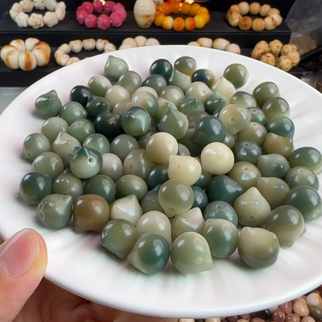 菩提根/象牙果手串卡11-12绿色飘花猫头100颗