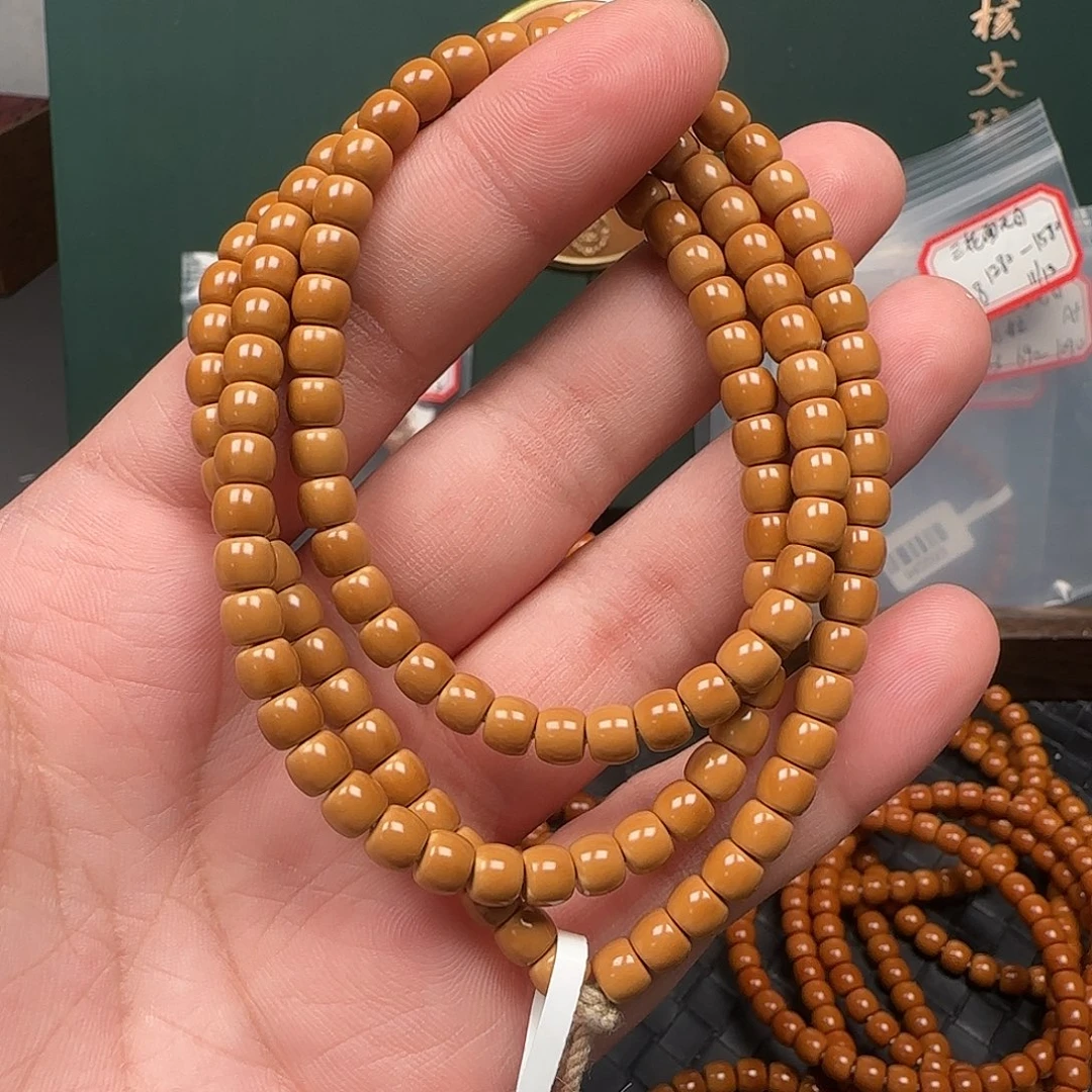 无***生橄榄核吊坠5.8mm老挝核尖极限弧108