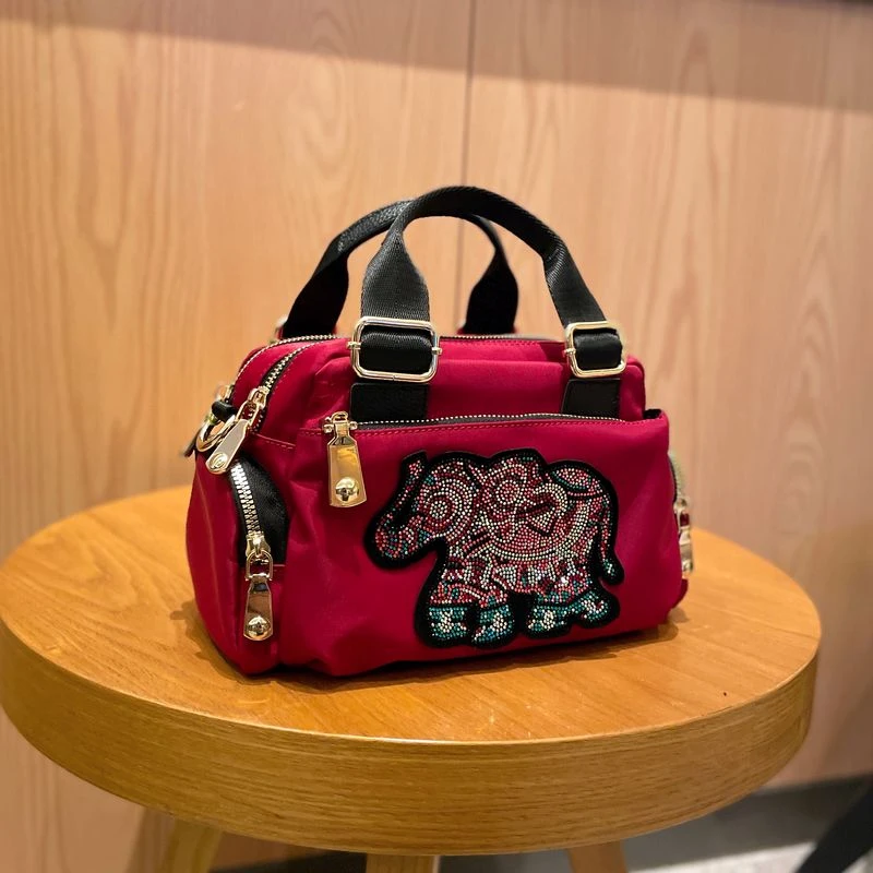 达芙世家洋气爆款2025新款时尚休闲女士斜挎包轻便洋气百搭手提包