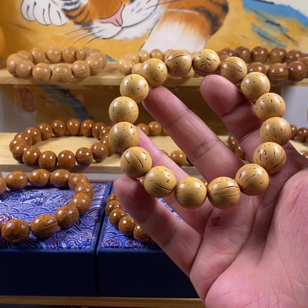 亚***惯桃核吊坠盘锦奶油核正圆