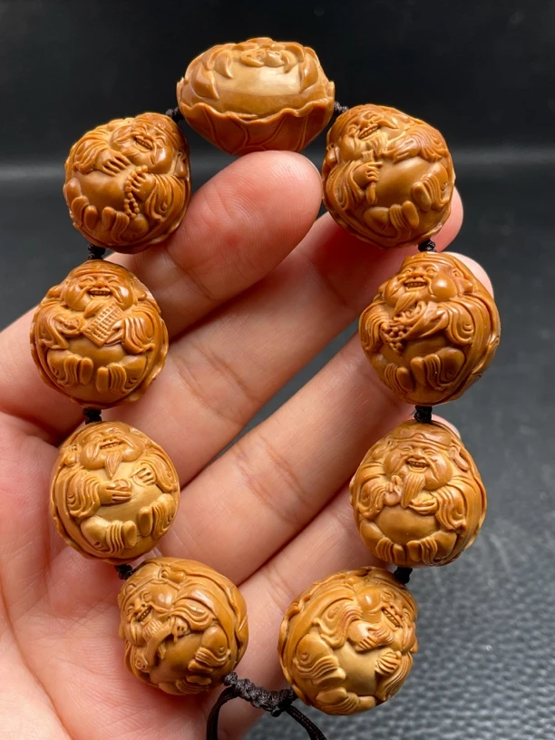 橄榄核雕刻2.0荷叶财神手串