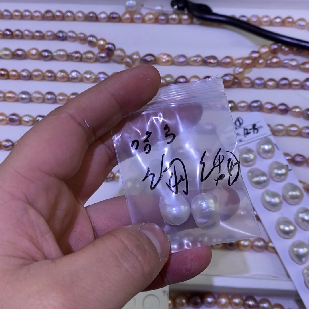 哈***哈耳环淡水珍珠银S925镶嵌