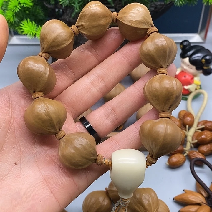 渔***行手串/手链橄榄核2525梅林铁四花