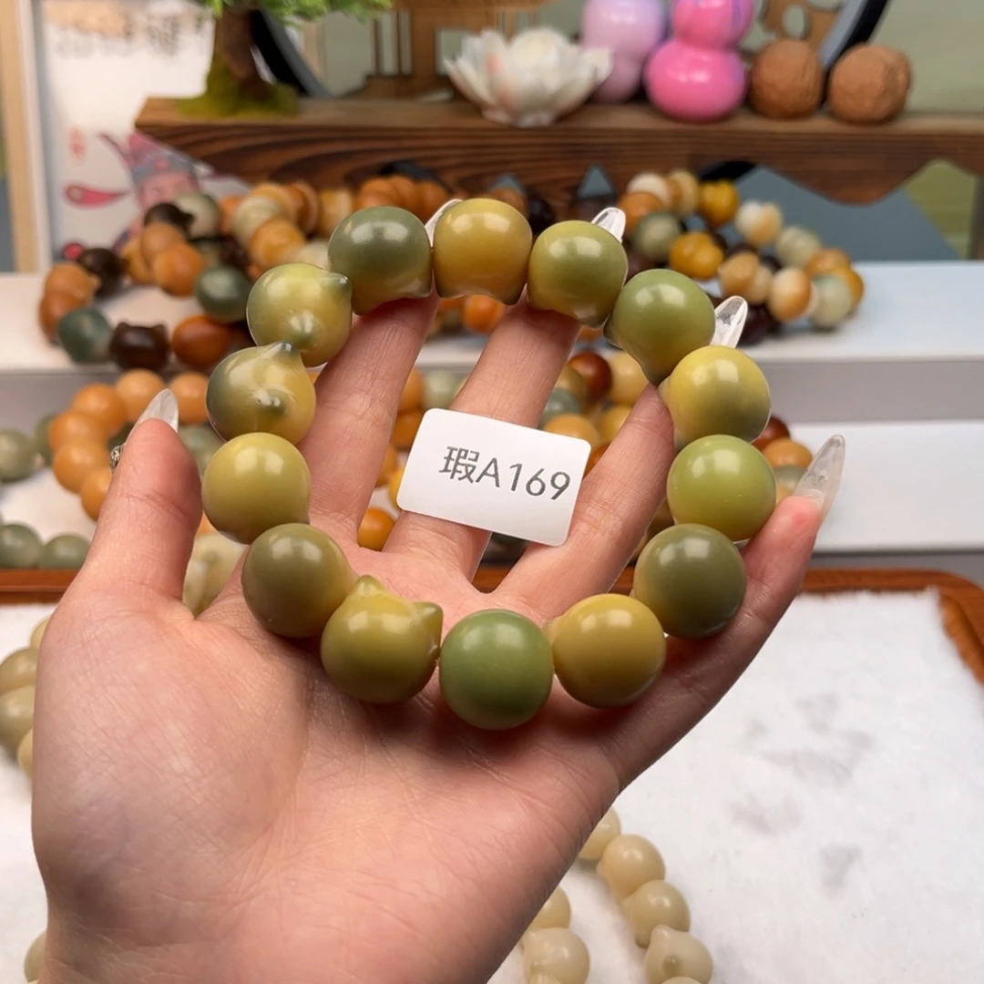 菩提根/象牙果吊坠17mm瑕猫头随机一串a169