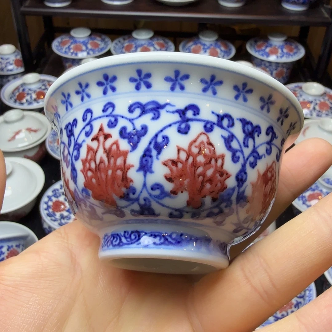 青花釉里红双狮压手杯瑕