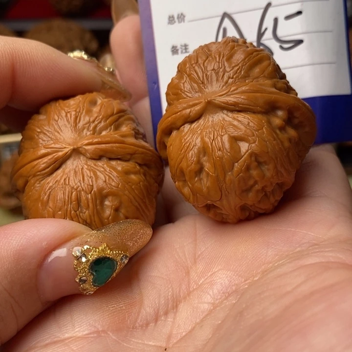 Q***生把件桃核全品大元宝