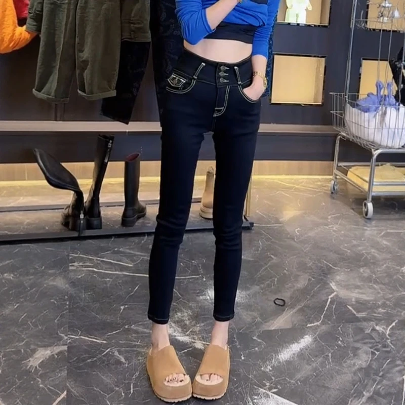 2025秋冬新款明线设计牛仔烟管裤大码女装高腰加绒加厚九分小脚裤