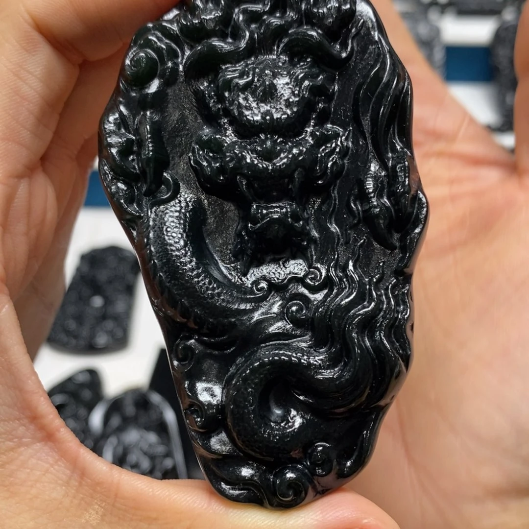 麻***欧未镶嵌蛇纹石玉吊坠