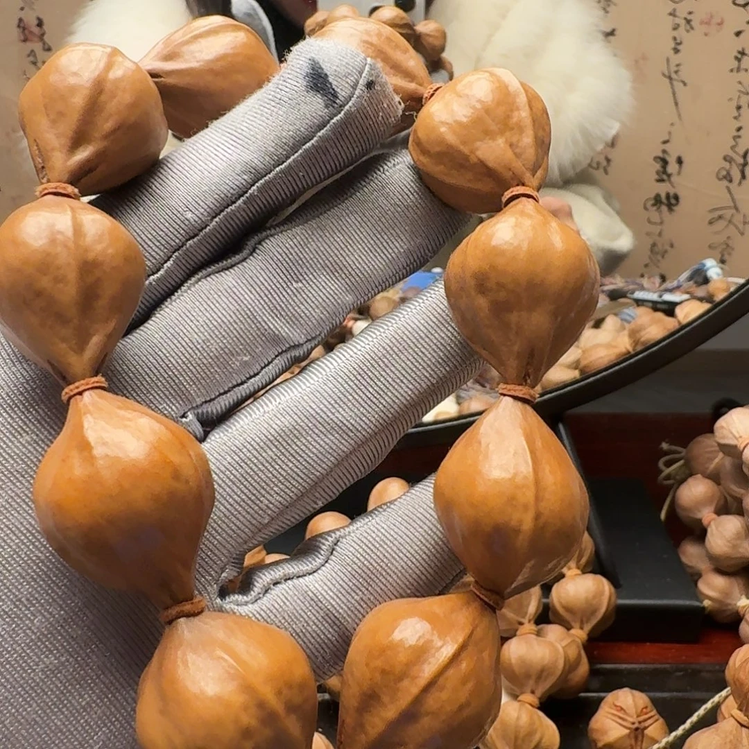 聆***音橄榄核手串水晶核蒜头