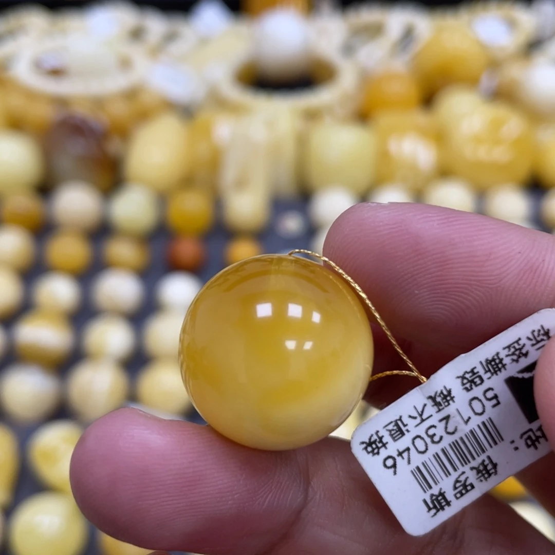 蜜蜡未镶嵌裸石19.6mm瑕疵妖花