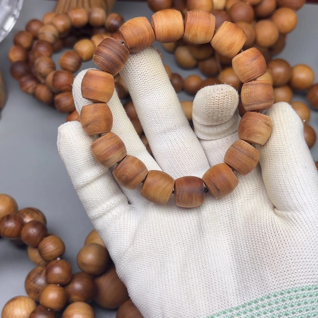 黯****柏木13成14直切黑油毛坯手串