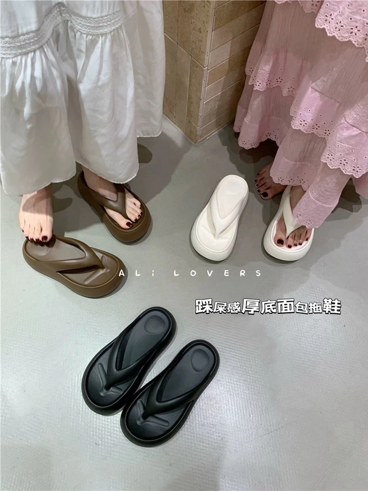 增高厚底人字拖女外穿2025夏季新款沙滩鞋踩屎感面包拖鞋夹脚凉拖