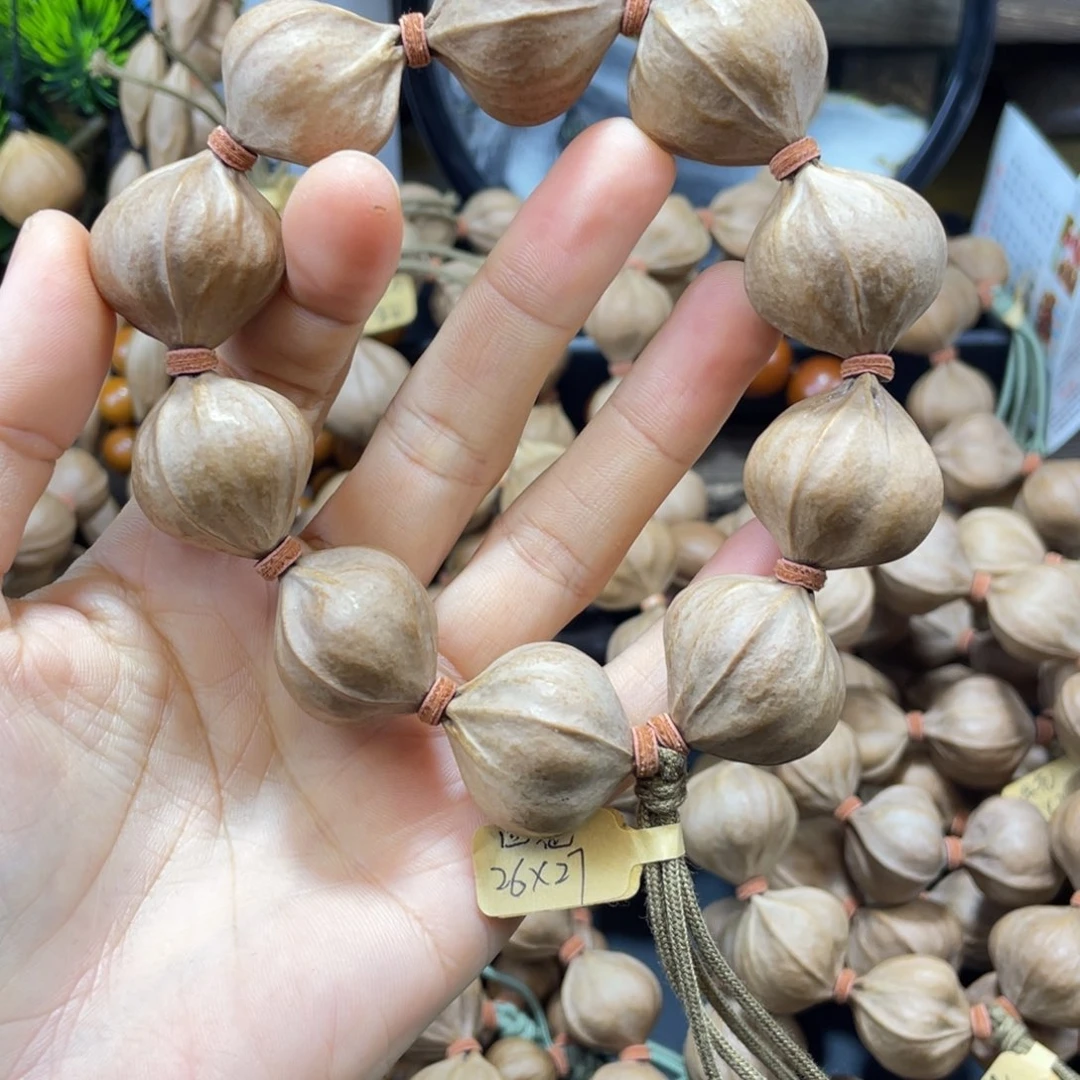 一***缘橄榄核吊坠2627四花