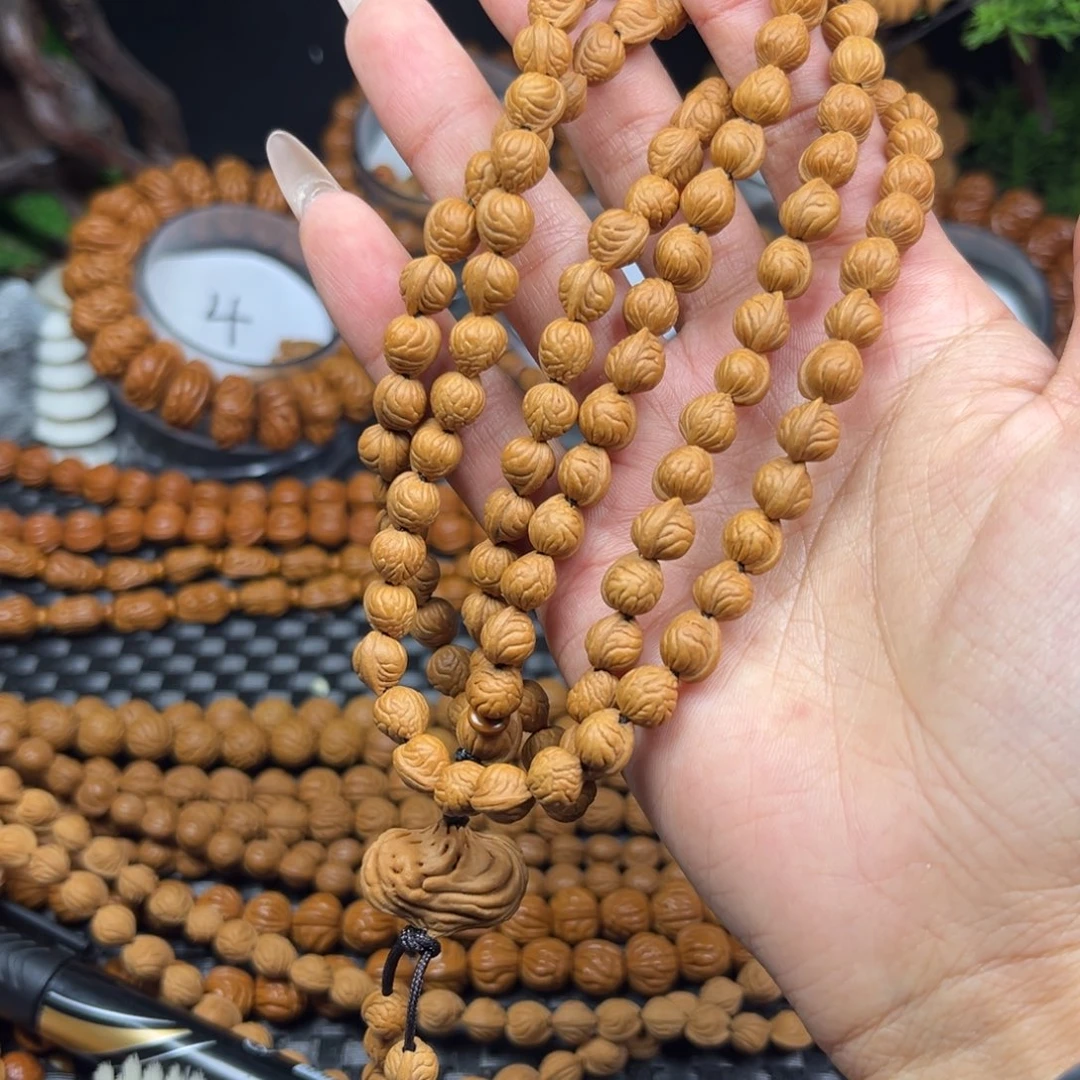 吊坠桃核小*羽桃核脖挂