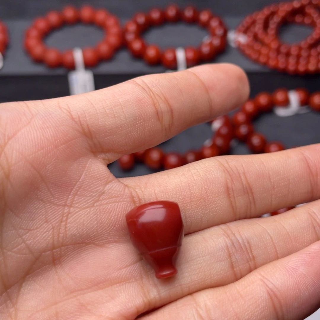问***主南红玛瑙未镶嵌手串H12.2mm牛血红三通