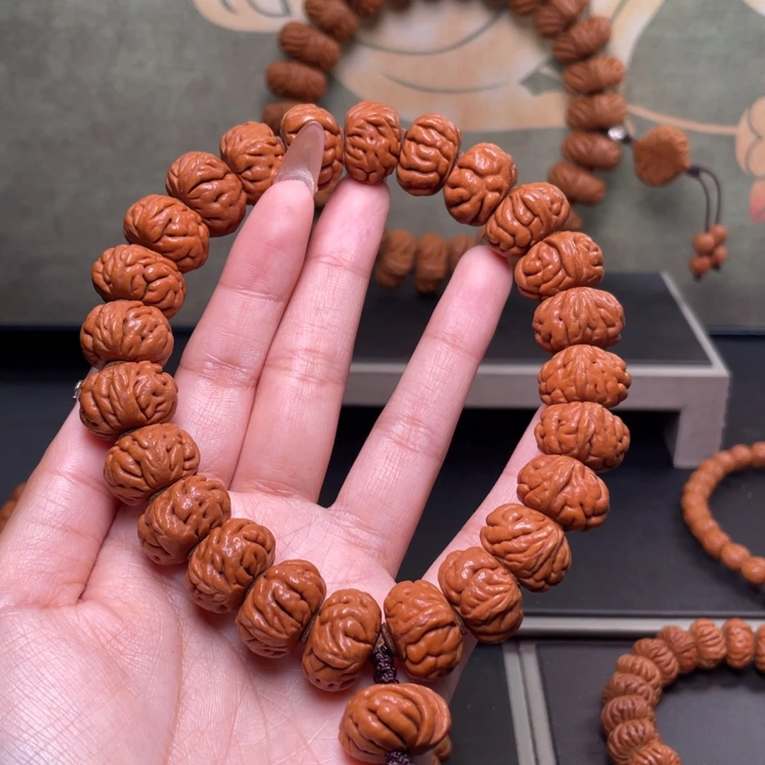 桃核吊坠18白玉龙手持