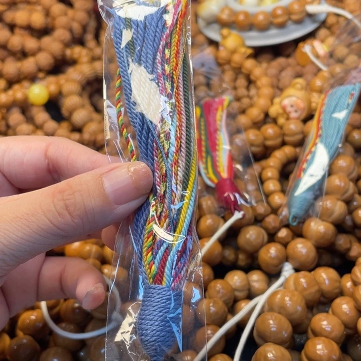 风***虹猴头雕刻流苏配饰