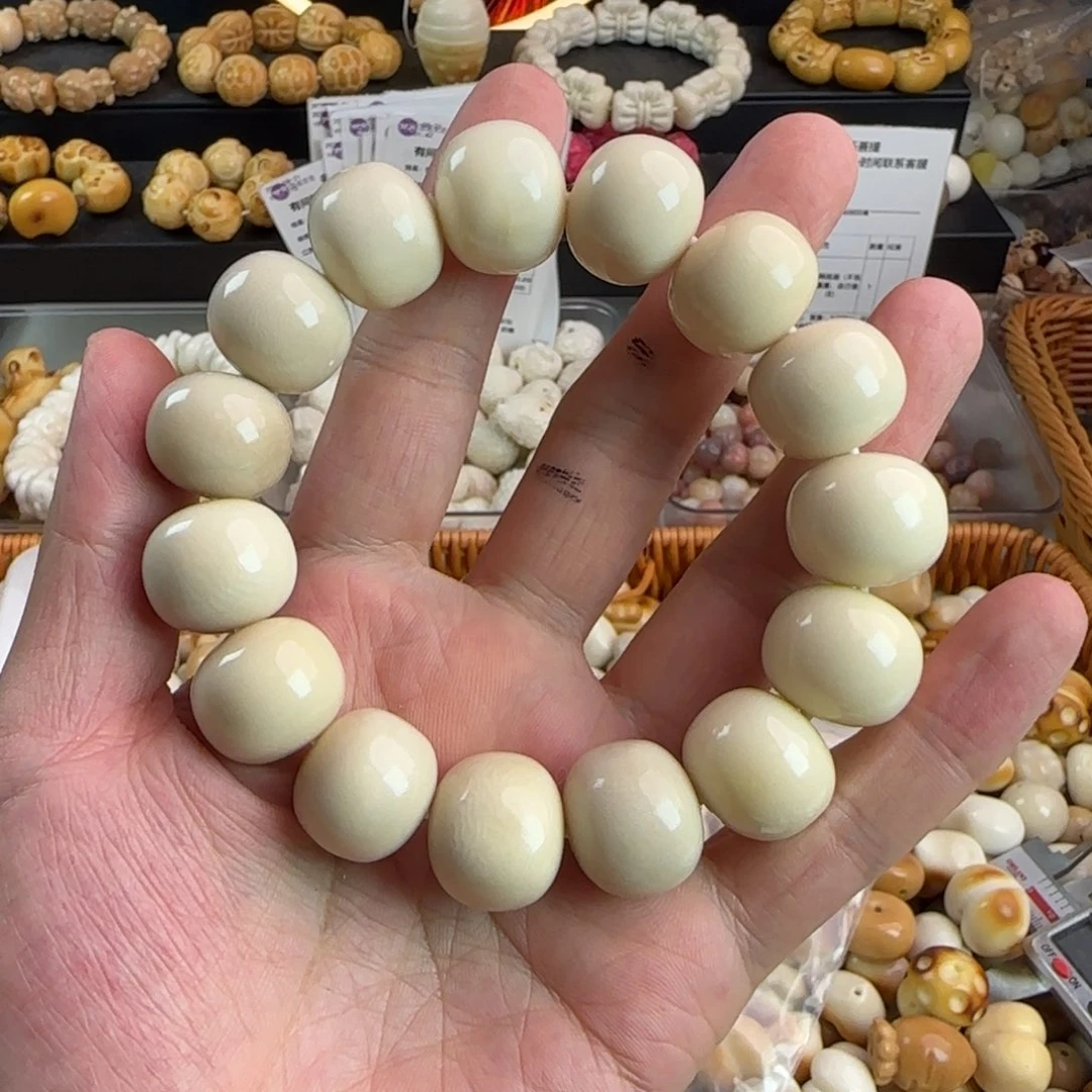吊坠菩提根/象牙果瑕疵象牙果白色手串一条