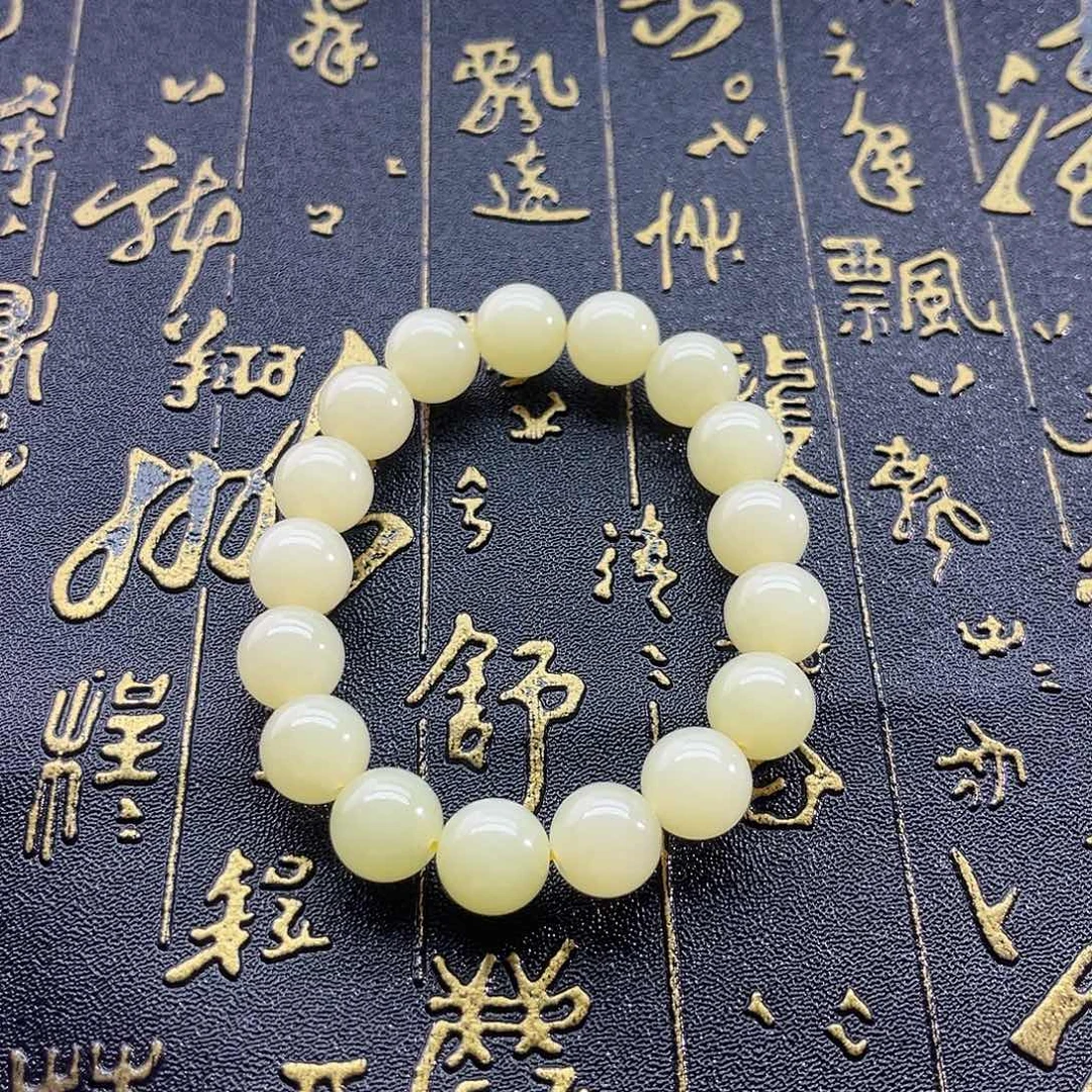 和田玉未镶嵌颈饰黄口-新疆若羌-柠檬黄-12mm手串