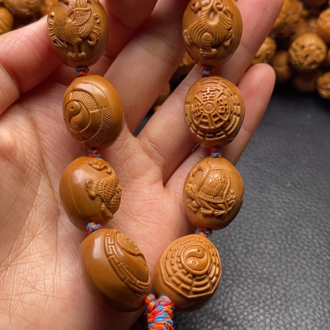 亮***橄榄核手串单面八卦