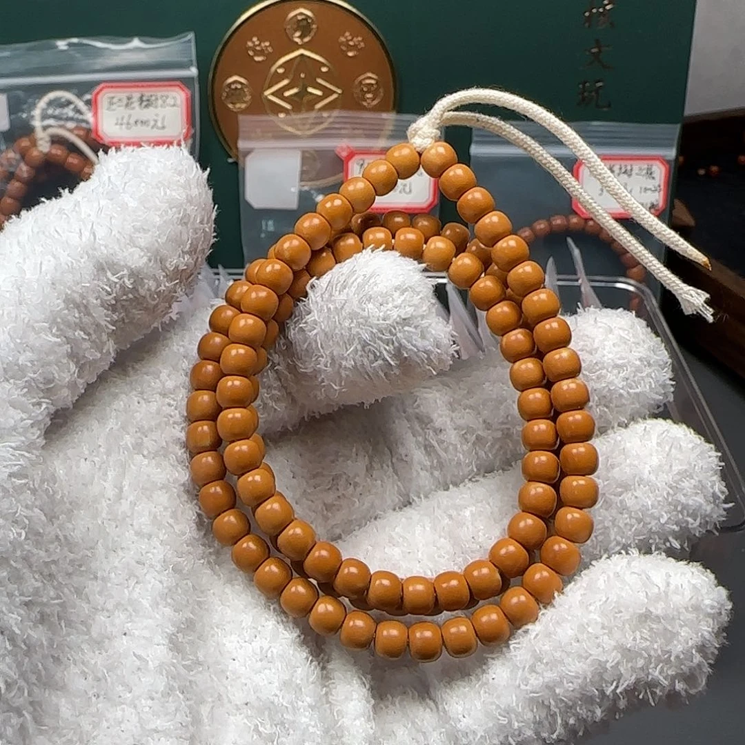 自***然吊坠橄榄核6.0mm老挝核尖长串福利款微白