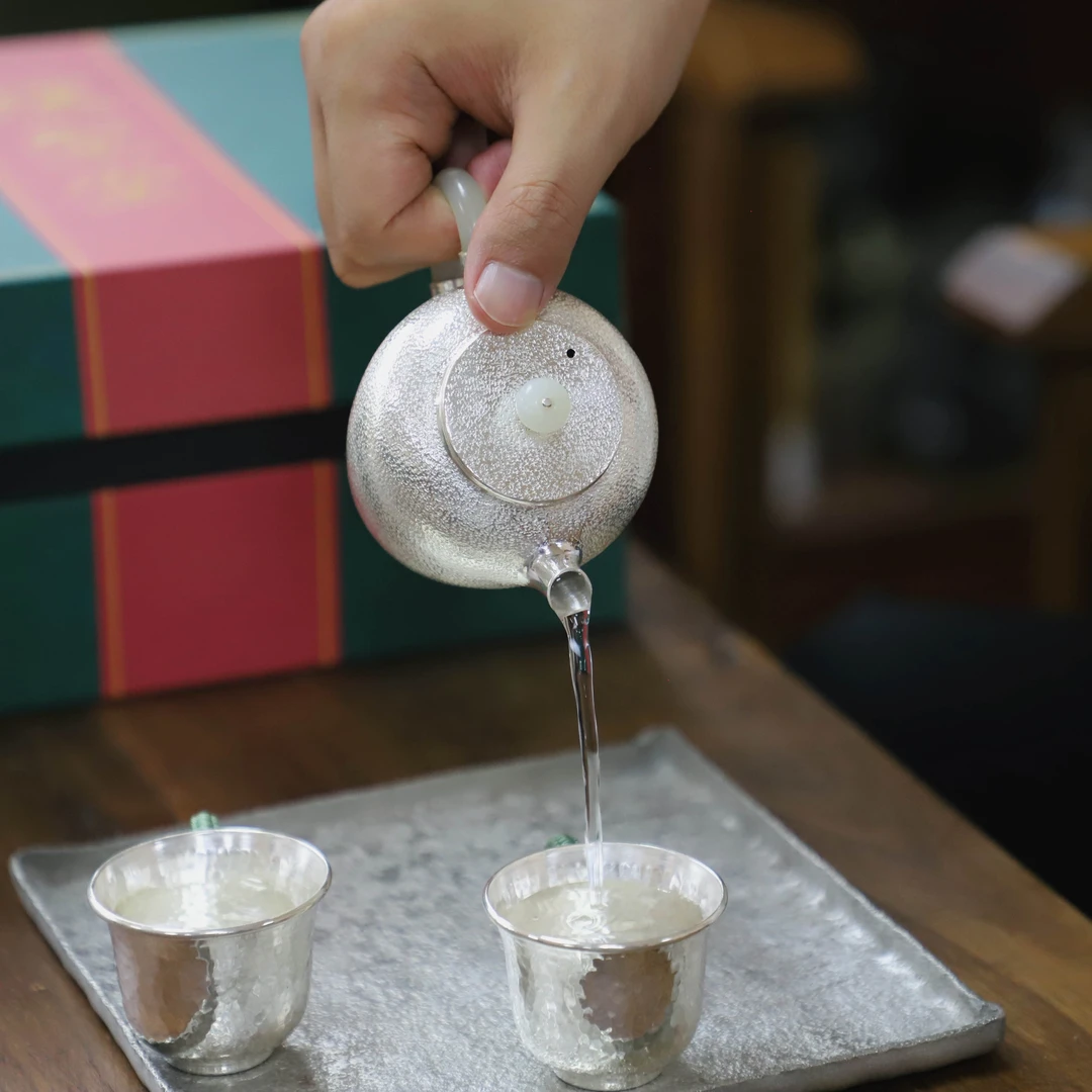 璞圣堂｜唐宫望月银壶套装足银999泡茶壶手抓壶一壶两杯主人杯茶具