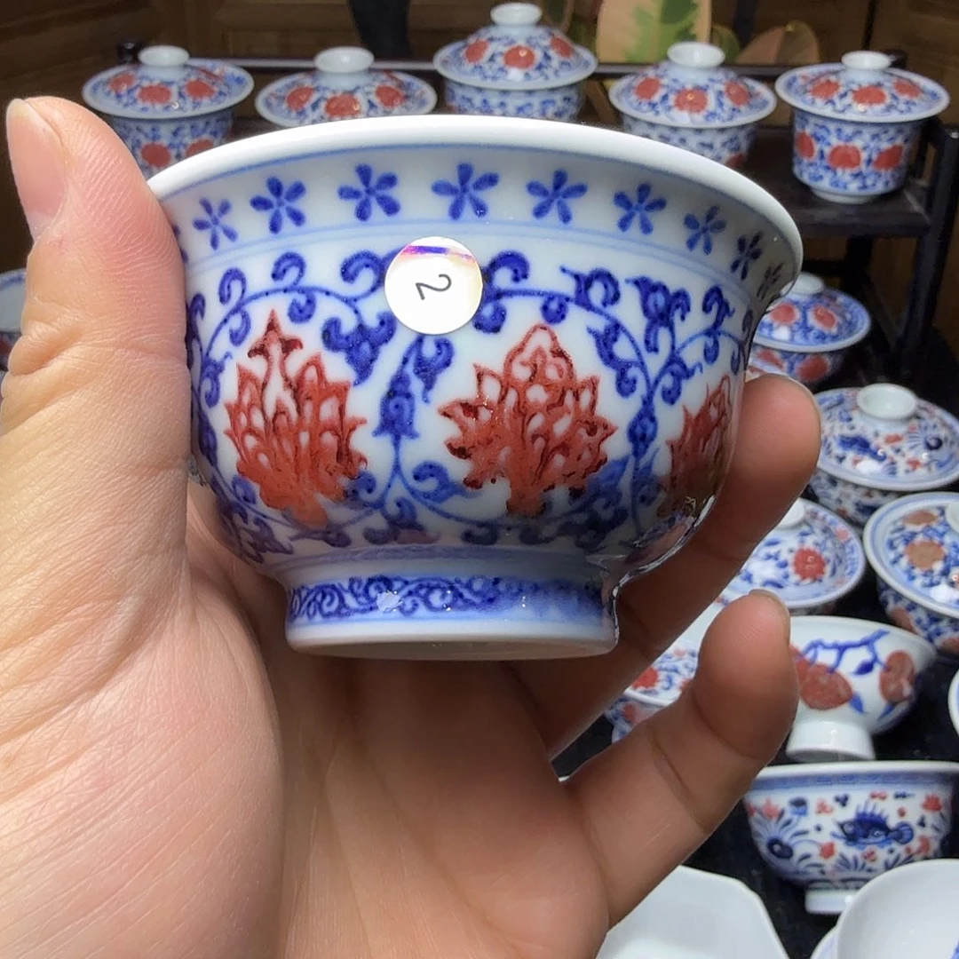 青花釉里红双狮压手杯瑕