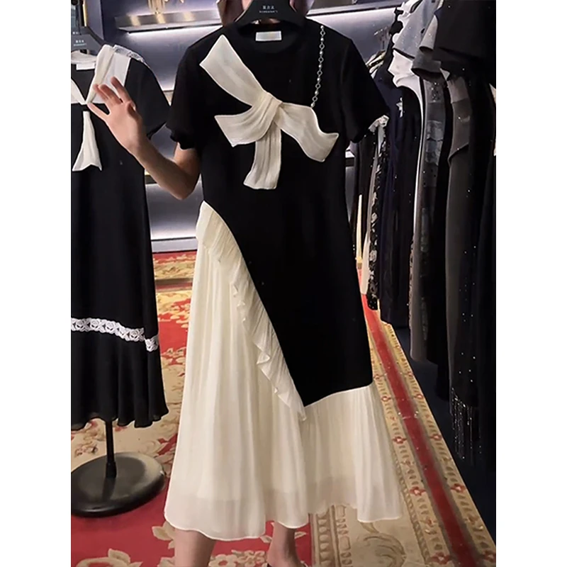 黑色蝴蝶结连衣裙女2025夏季新款不规则撞色拼接裙子赫本风中长裙