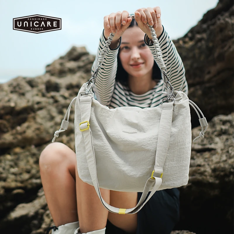 UNICARE慵懒风单肩背包女运动休闲J饺子包福袋包云朵包大容量