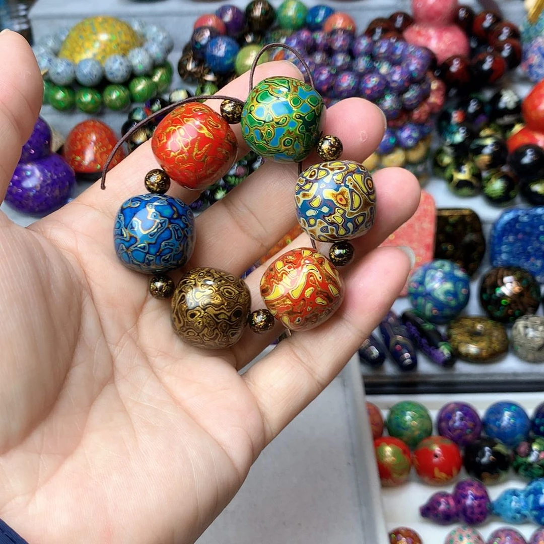 心*大漆千层犀皮2.1*2.1*6颗加0.6隔珠6颗如图