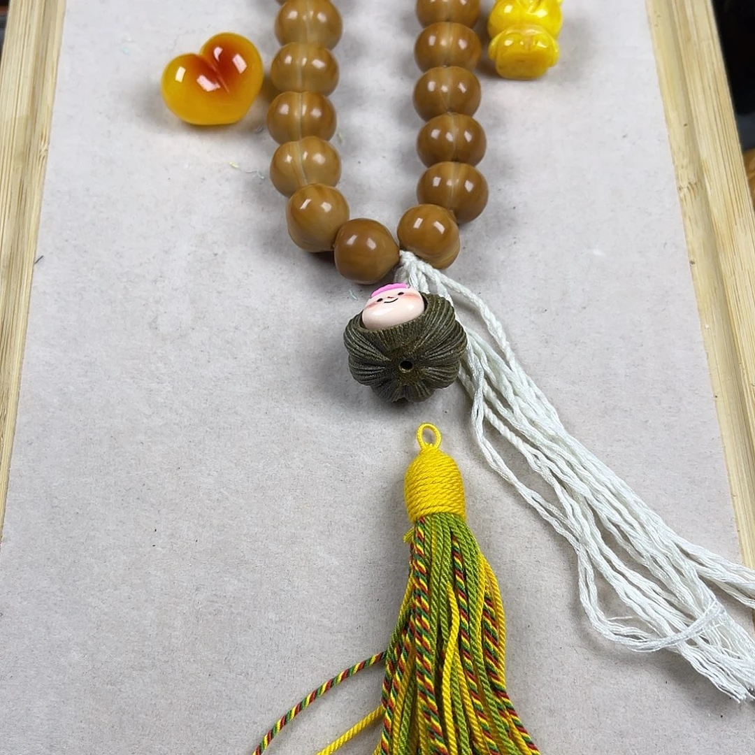 我****手串猴头核桃屁桃