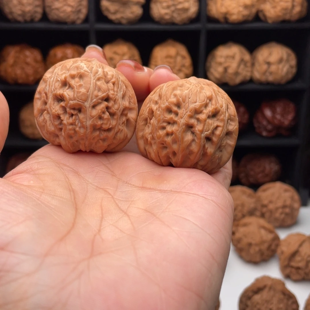 桃核把件平谷元宝………………