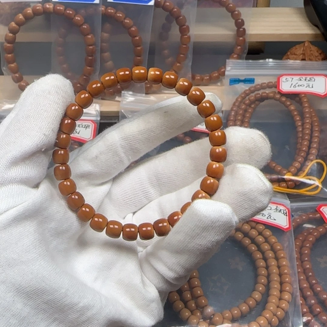 手串橄榄核老挝单圈极限弧三花无白7.3mm