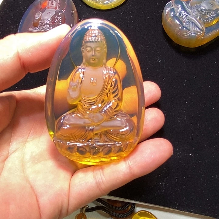 浅***然裸石琥珀未镶嵌柳青阿弥陀佛31克全净水