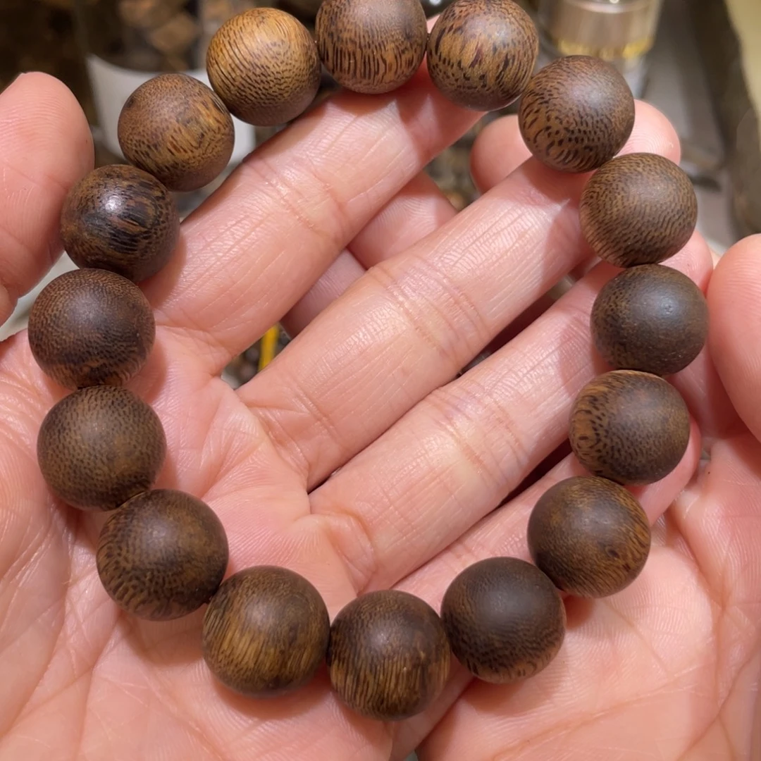 青***云手串沉香乌身圆叶1.4单圈