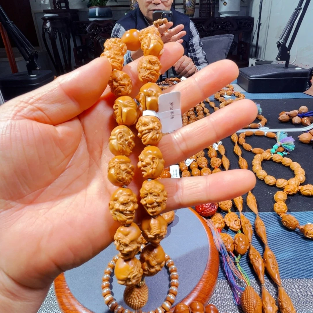 橄榄核吊坠新人在这里